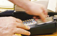 Bloomberg News Photo<b>More consumers</b> are preferring to make purchaes with credit and debit cards. Bloomberg News Photo More consumers are preferring to make purchaes with credit and debit cards.