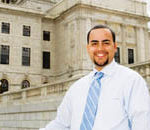 Solar power for affordable living PBN Staff photo/Stephanie Ewens
JULIAN DASH, shown here before testifying on an energy bill last week at the State House, has started a development company with his brother, Gordon, to create affordable housing and commercial space that uses renewable energy.