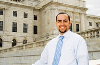 PBN Staff photo/Stephanie Ewens
<b>JULIAN DASH,</b> shown here before testifying on an energy bill last week at the State House, has started a development company with his brother, Gordon, to create affordable housing and commercial space that uses renewable energy. PBN Staff photo/Stephanie Ewens<br><br>
<b>JULIAN DASH,</b> shown here before testifying on an energy bill last week at the State House, has started a development company with his brother, Gordon, to create affordable housing and commercial space that uses renewable energy.