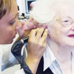 Hearing aid centers tune in to success PBN Staff photo/Stephanie Ewens
Anna Wittich, of Providence, gets her ears inspected by Janet Rocha at a Beltone New England hearing center in Warwick.