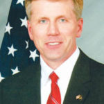 Charles Summers, New England regional director of the SBA, spends much of his time on the road.