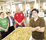 A notch above in digital printing PBN photo/Frank Mullin
IO Labs in Pawtucket specializes in high-end digital printing, such as this reproduction of an historical map of Little Compton.
Pictured, from left, are Brad Foster, Cara Burgess, and partners Stuart Linacre and Ted Peffer.