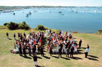 PHOTO COURTESY THE SULLIVAN HOUSE<b>A COUPLE</b> exchanges vows on the lawn of The Sullivan House on Block Island, which hosts at least 20 weddings per year, many involving New York brides. PHOTO COURTESY THE SULLIVAN HOUSEA COUPLE exchanges vows on the lawn of The Sullivan House on Block Island, which hosts at least 20 weddings per year, many involving New York brides.