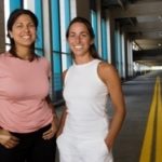 A bridge to the future, in a tree IN PROGRESS: On-site at the Providence Place mall parking garage - where they're working to minimize motorists' confusion and anxiety - are Multi Design for People LLC co-owners Rosanne Ramos, left, and Kat Darula. /