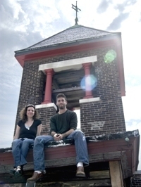 PBN photo/Frank Mullin
Founder Nick Bauta, an artist and RISD grad, with director Anna Shapiro atop the old firehouse. PBN photo/Frank Mullin<br>
Founder Nick Bauta, an artist and RISD grad, with director Anna Shapiro atop the old firehouse.