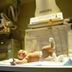PBN PHOTO/FRANK MULLIN
JAKE MAIELLO, just eight weeks old, lies on the platform of a fluoroscopy machine in the new Hasbro Children's Hospital Center for Pediatric Imaging.