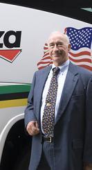 George M. Sage, Bonanza Bus founder, dies at 74 GEORGE SAGE poses with one of 'Sage's Stages,' in this Peter Pan Bus Lines photo.