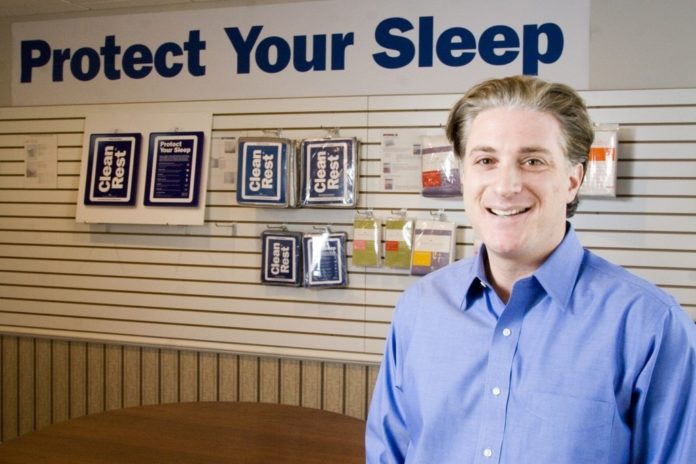 GARY GOLDBERG, CEO of CleanBrands LLC, shows off the new packaging and motto for his company's CleanRest mattress and pillow covers, which block even the tiniest allergens. Goldberg's goal is to lead that segment of the market. / 