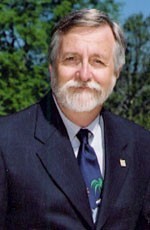 ROBERT L. CAROTHERS, president of URI, who signed the agreement Friday in Nassau, thanked the R.I. National Guard "for uncovering this tremendous opportunity."   / 