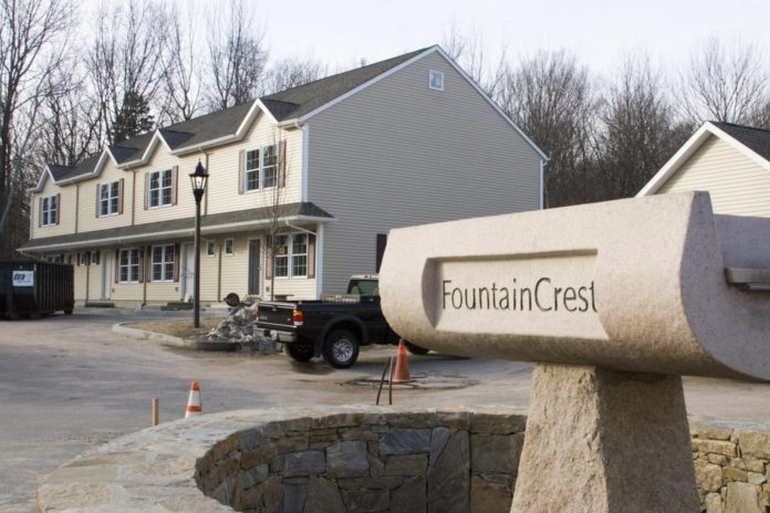 FOUNTAINCREST, a 76-unit condo complex south of Route 1, is one of the highest-profile new developments in the town. / 