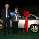 Support technician wins car in Citizens giveaway REWARD FOR LOYALTY: Sir Fred Goodwin, group chief executive for the Royal Bank of Scotland, presents a ceremonial key (and the real keys, too) to Catherine Bolster at the Citizens Bank operations center in Cranston. /