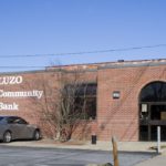 LUZO COMMUNITY BANK started looking for a buyer two years ago because its CEO, Jose Gouveia, felt the bank could better serve its customers with a larger partner. / 