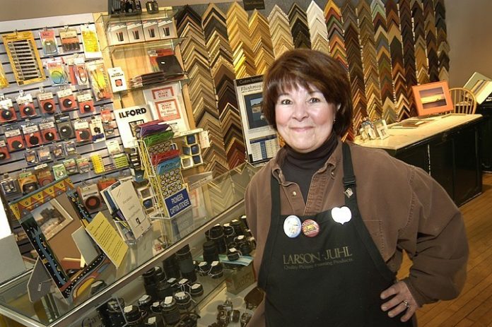 THE CAMERA WERKS owner Patricia Zacks keeps her business alive with good, old-fashioned customer service and offerings like custom framing; instead of photo developing, she now offers a digital photo printing station. / THE CAMERA WERKS owner Patricia Zacks keeps her business alive with good, old-fashioned customer service and offerings like custom framing; instead of photo developing, she now offers a digital photo printing station. /