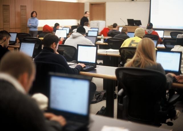 STAYING FOCUSED: Bryant University students are engaged in an information resources technology class, in the George E. Bello Center for Information and Technology. / STAYING FOCUSED: Bryant University students are engaged in an information resources technology class, in the George E. Bello Center for Information and Technology. /