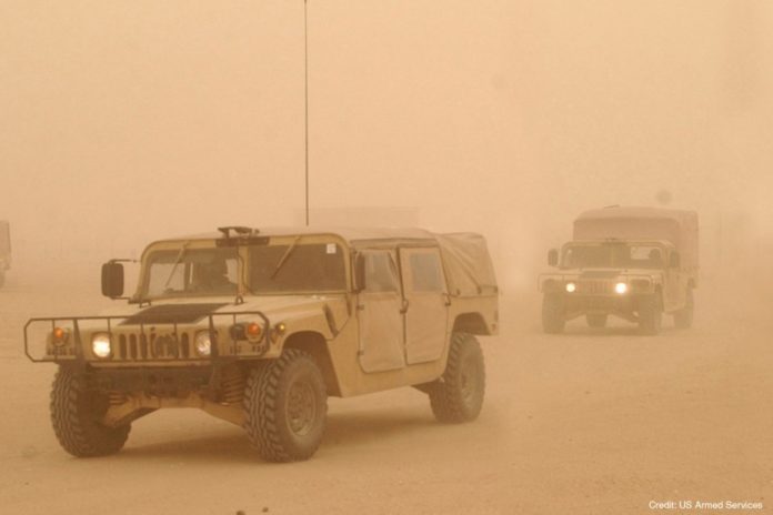 TACNAV systems allow military vehicles like this Humvee to navigate in poor visibility and to become part of a battlefield network. / 