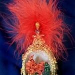 First Lady accepts 2007 R.I. State Egg THE 2007 STATE EGG features Swarovski crystals and gold findings on a pearlized egg, and contains a sculpted Rhode Island Red. /