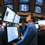 Stocks rise on earnings news, Sallie Mae bid TRADERS WORK on the floor of the New York Stock Exchange last week. /