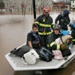 IRS gives N.E. storm victims until April 26 to file A FAMILY in Bound Brook, N.J., is borne to safety Monday by local firefighters after the storm left their neighborhood underwater. /