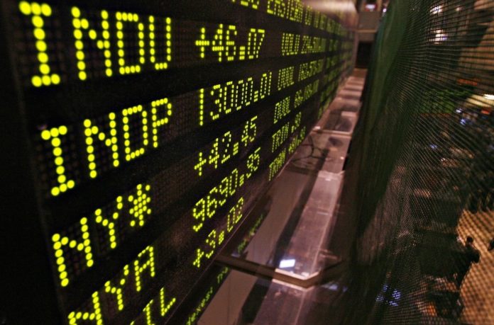AN ELECTRONIC BOARD hanging above the floor of the New York Stock Exchange shows the Dow Jones Industrial Average at 13,000.01 shortly after the market opened this morning. The index continued to rise, closing at 13,089.896 points. / AN ELECTRONIC BOARD hanging above the floor of the New York Stock Exchange shows the Dow Jones Industrial Average at 13,000.01 shortly after the market opened this morning. The index continued to rise, closing at 13,089.896 points. /