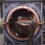 Wind-power trend gives boost to TPI DAVID M. DUARTE, a worker at TPI Composites, stands at the root end of a 46-meter mold used to make wind energy turbines. /