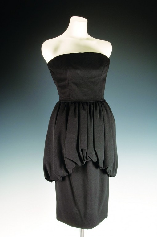 'THE LOOK' EXHIBIT at Rough Point features this black strapless dress by Christian Dior for Yves St. Laurent, circa 1959. / 'THE LOOK' EXHIBIT at Rough Point features this black strapless dress by Christian Dior for Yves St. Laurent, circa 1959. /