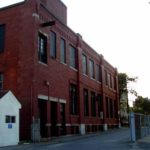 JWU plans student center<br> in Rolo Building THE ROLO BUILDING has been vacant for years though its lot has been used by JWU for staff and faculty parking. /