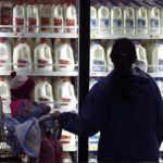 WAL-MART has been making its stores more energy-efficient to improve its bottom line. Above, a store in Kansas City, Mo., where the cases have LED lighting. / 