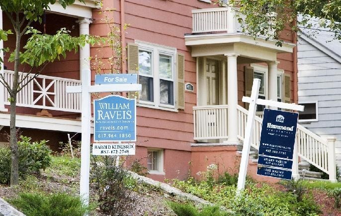 HOUSES are remaining on the market longer, which is causing problems for some owners, The Warren Group says. Above, two homes for sale in Newton, Mass. / HOUSES are remaining on the market longer, which is causing problems for some owners, The Warren Group says. Above, two homes for sale in Newton, Mass. /