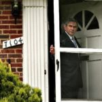 PAUL WOLFOWITZ leaves his home in Chevy Chase, Md., on May 18, the day after announcing his resignation as World Bank president, effective June 30. / 