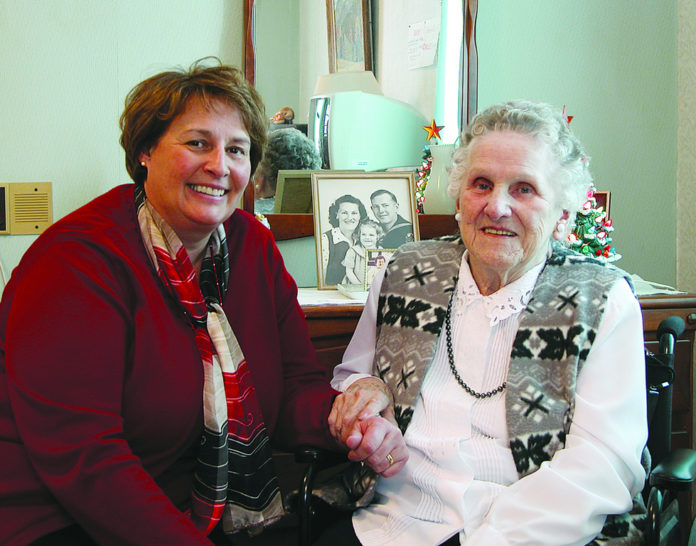 DOROTHY EDWARDS, right, a nursing home resident and longtime Hope & Hospice Care of Rhode Island patient, sits with her nurse and case manager, Linda Tolmie. / 