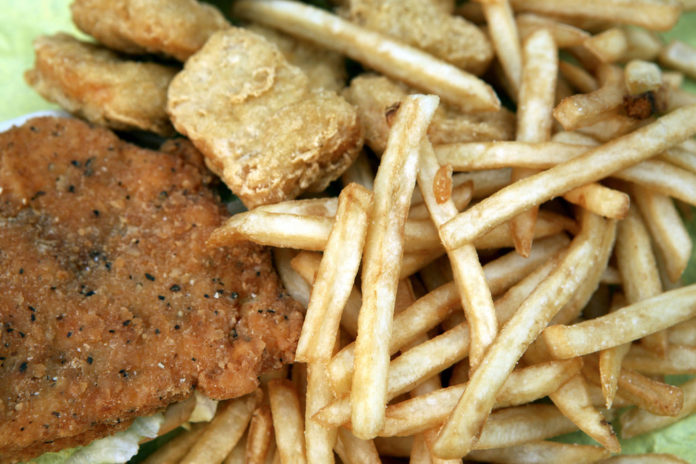 NATIONWIDE, most fried foods still are cooked in oils that contain trans fats. Above, fried foods from McDonald's, which cites the difficulties of finding a good replacement oil. / 