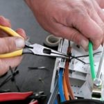 Verizon launches FiOS TV in R.I. A VERIZON technician works on the company's fiber-optic network. /