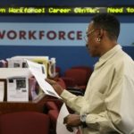 JOB-SEEKER Herbert Samuels uses the Brooklyn Workforce1 Career Center last month, when job growth rebounded from April's 2-year low. / 