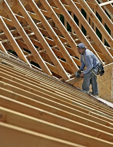 CONSTRUCTION JOBS increased over the psat month in both Rhode Island and Massachusetts, the BLS said. Above, carpenter Paulo Sousa works on a house last month in The Enclave at Meadow Lake, a new neighborhood in Mahway, N.J. / CONSTRUCTION JOBS increased over the psat month in both Rhode Island and Massachusetts, the BLS said. Above, carpenter Paulo Sousa works on a house last month in The Enclave at Meadow Lake, a new neighborhood in Mahway, N.J. /