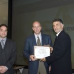 Federal Electronics honored by Raytheon IDS FEDERAL ELECTRONICS Inc. Account Manager Chris Heywood and VP Ed Evangelista accept the Supplier Excellence Award from Zack Noshirwani, integrated supply chain VP for Raytheon IDS. /
