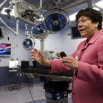 Miriam gets new inpatient/surgical center BRAND NEW DIGS: Kathleen Hittner, president and CEO of The Miriam Hospital, leads a tour last week of the new inpatient and surgical services center set to open today. /
