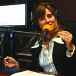 VANESSA TOLEDO-VICKERS tapes her show, which focuses on business issues, at Latino Public Radio last Wednesday. / 