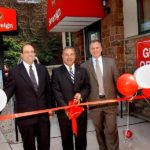 SOVEREIGN BANK's Brian Azar, left, R.I. community banking regional executive; Steve Issa, center, New England South CEO; and Tim Monahan, R.I. community banking area manager, at the ribbon-cutting ceremony. / 