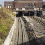 THE DEPOT, as townspeople call the former Pawtucket/Central Falls Station, straddles the railway line and the city line. The curve in the tracks makes it less desirable as a new commuter rail station,  a study found. / 