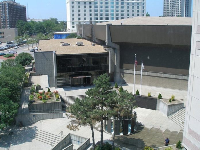 IN THIS 2006 VIEW, before the latest round of renovations started, the Dunkin' Donuts entrance is not connected with the Convention Center. / 