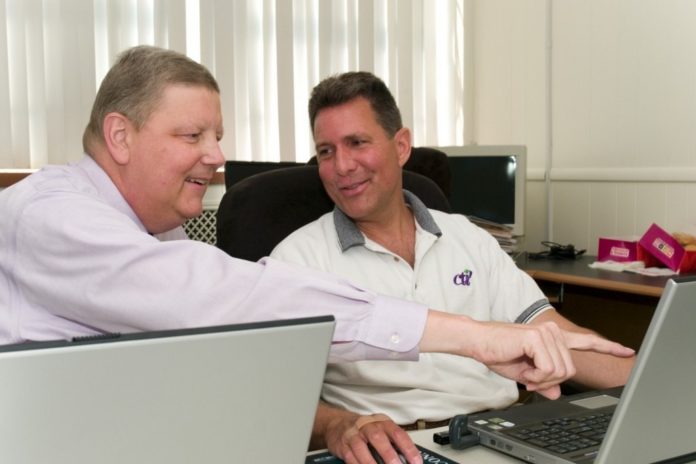 David Buckley, left, and Ed Johnson flew combat missions during Operation Desert Storm; now they are working together to create a better way for pilots to share information. / David Buckley, left, and Ed Johnson flew combat missions during Operation Desert Storm; now they are working together to create a better way for pilots to share information. /