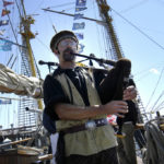CHARLIE RAFERTY  plays the bagpipe aboard the 65-foot Continental Sloop Providence, a replica of the first vessel commanded by John Paul Jones during the Revolutionary War. / 