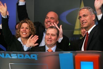 JEFF THOMPSON, center front, president and CEO of Towerstream Corp., presides over the opening bell at Nasdaq on June 1, the day after the company began trading on the market. / JEFF THOMPSON, center front, president and CEO of Towerstream Corp., presides over the opening bell at Nasdaq on June 1, the day after the company began trading on the market. /