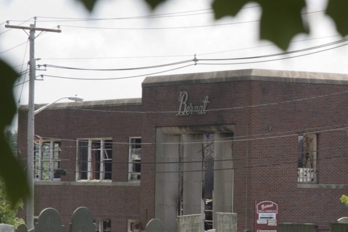 Tenants of the Bernat Mill in Uxbridge, which was the site of a six-alarm blaze in July, have been slow in taking out U.S. Small Business Administration loans. / Tenants of the Bernat Mill in Uxbridge, which was the site of a six-alarm blaze in July, have been slow in taking out U.S. Small Business Administration loans. /