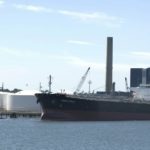 Record exports help shrink U.S. trade gap DESPITE HIGH OIL COSTS, the U.S. trade deficit shrank in June, the BEA said in a report today. Above, an oil tanker sits at a dock next to petroleum holding tanks in New Haven, Conn., last month.
/