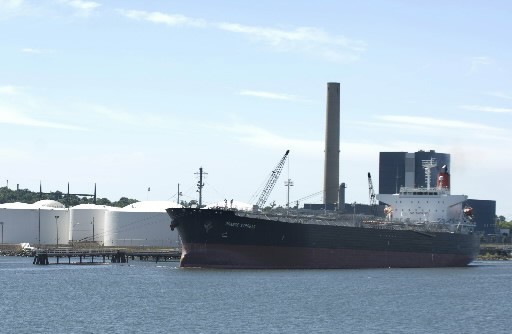 DESPITE HIGH OIL COSTS, the U.S. trade deficit shrank in June, the BEA said in a report today. Above, an oil tanker sits at a dock next to petroleum holding tanks in New Haven, Conn., last month.
/ DESPITE HIGH OIL COSTS, the U.S. trade deficit shrank in June, the BEA said in a report today. Above, an oil tanker sits at a dock next to petroleum holding tanks in New Haven, Conn., last month.
/
