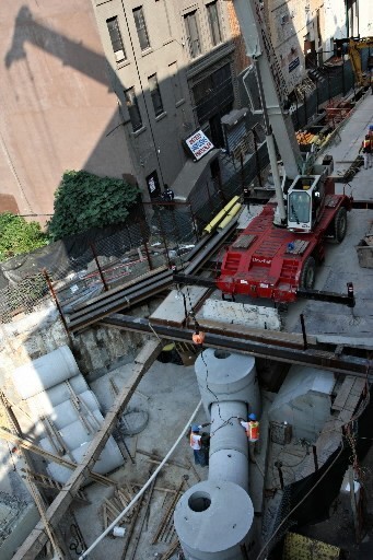 GOVERNMENT SPENDING and commercial construction both helped boost the July GDP. Above, workers with Judlau Contracting fit cement piping for an MTA project at Rockwell Place in Brooklyn, N.Y. / GOVERNMENT SPENDING and commercial construction both helped boost the July GDP. Above, workers with Judlau Contracting fit cement piping for an MTA project at Rockwell Place in Brooklyn, N.Y. /