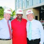 FROM LEFT, Gilbane Building Co. Chairman and CEO Thomas Gilbane Jr.; Wayne Blackman, project safety supervisor; and William Gilbane Jr., president and COO, tour the Waterplace Condominiums project. / 