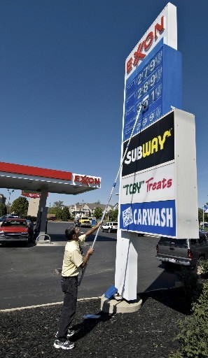 NATIONWIDE, the average price of self-serve regular gasoline was $2.789 per gallon, 13 cents higher than in Rhode Island. Above, Tom Reaves changes the price on the sign outside an Exxon station in Columbus, Ohio. / NATIONWIDE, the average price of self-serve regular gasoline was $2.789 per gallon, 13 cents higher than in Rhode Island. Above, Tom Reaves changes the price on the sign outside an Exxon station in Columbus, Ohio. /