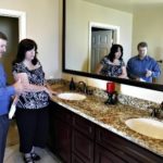 Existing home sales fall 4.3% in August MORTGAGE ISSUES and buyer fears drove down existing home sales in August, the NAR said. In Crest, Calif., this weekend, Realtor Todd Mitchell tours a house with prospective buyer Tonya Burgess. /